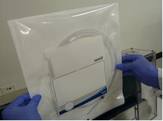 guidewires are shown loaded in a pouch, ready for sealing.
