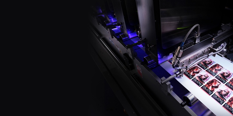 Industrial high-speed digital inkjet printing press utilizing ultraviolet (UV) curing and precision printbar technology