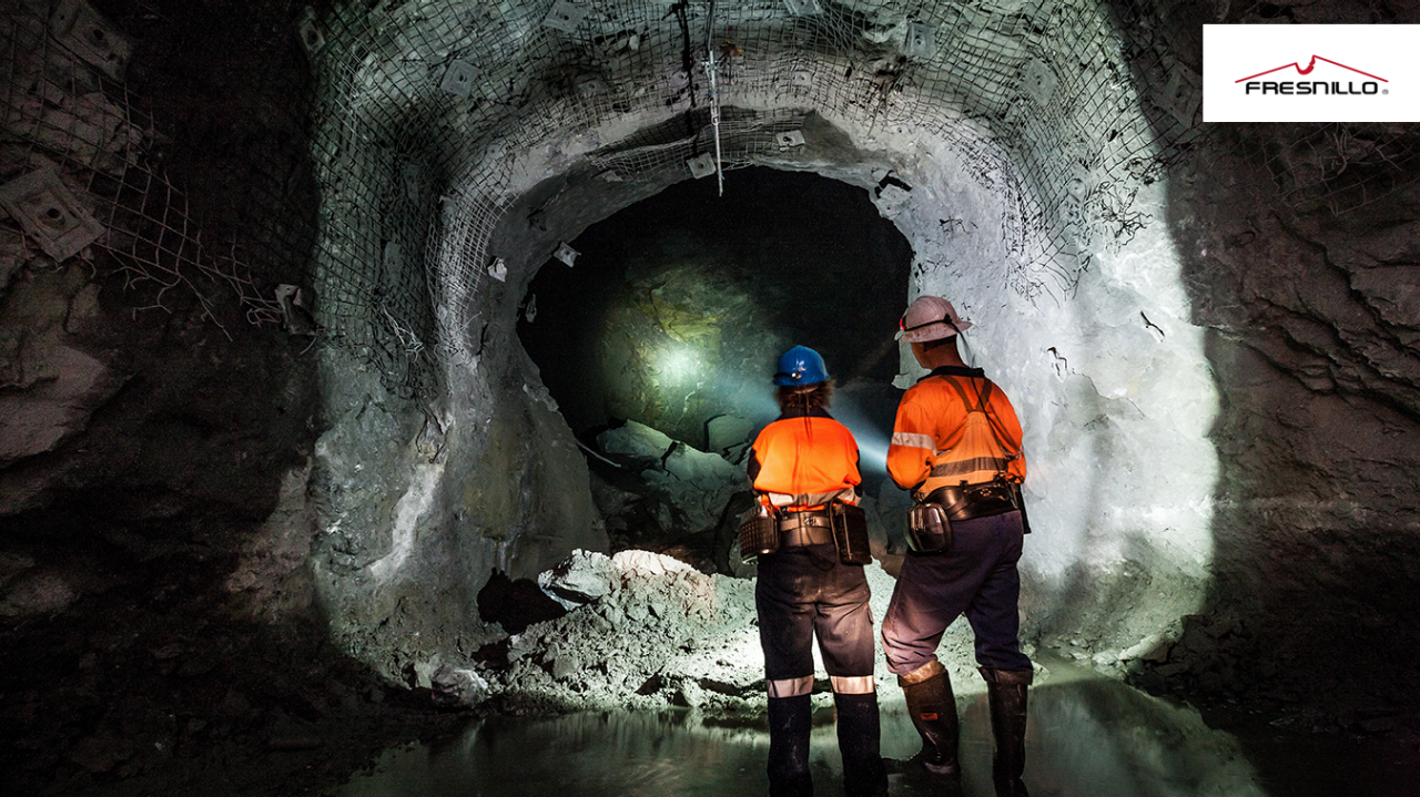 Miners underground at a copper mine in NSW, Australia collecting metals and mining data with Fresnillo logo.